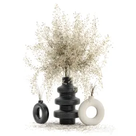 Indoor dry plants in rusty concrete pots